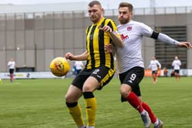 David Goodwillie in action against Dumbarton in Clyde's last match before lockdown