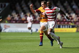 Motherwell's Jordan White battles with Accies scorer Hakeem Odoffin during Saturday's Lanarkshire derby at Fir Park (Pic by Ian McFadyen)