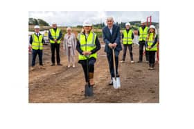Taylor Wimpey staff and representatives of East Renfrewshire Council at the  ground breaking ceremony.
 (Photo:  Iain McLean
)