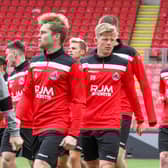 New signings Josh Jack (no 20) and Jay Henderson (no 18) training with their new Clyde team-mates (pic: Craig Black Photography)