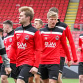 New signings Josh Jack (no 20) and Jay Henderson (no 18) training with their new Clyde team-mates (pic: Craig Black Photography)