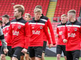 New signings Josh Jack (no 20) and Jay Henderson (no 18) training with their new Clyde team-mates (pic: Craig Black Photography)