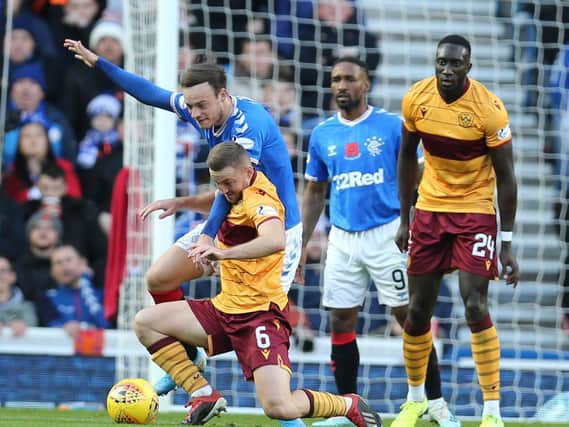 Bevis Mugabi (1st right) thinks Motherwell can finish in the top six this season (Pic by Ian McFadyen)