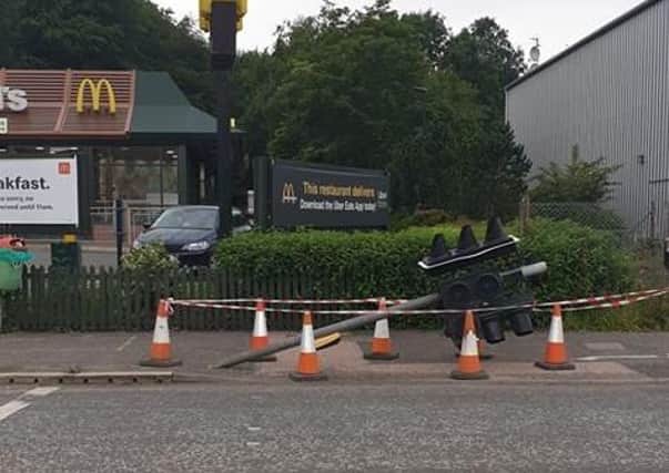 The traffic lights outside McDonald’s in Milngavie Road, Bearsden, were left nearly horizontal after presumably being hit by a car