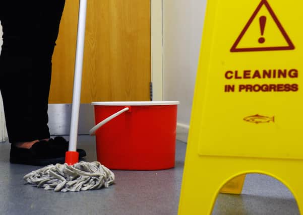 10-04-2019. Picture Michael Gillen. GRANGEMOUTH. Grangemouth Office. Mop and bucket for cleaning story. Bucket and mop.