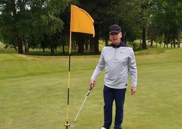 Michael McGlade of Kirkintilloch Golf Club after a hole in one