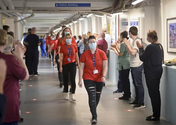 Staff and patients thank volunteers at Glasgow Royal Infirmary with a Guard of Honour.