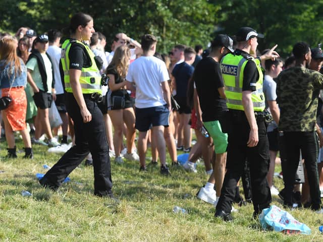 Large crowds gather at Kelvingrove Park in the summer 