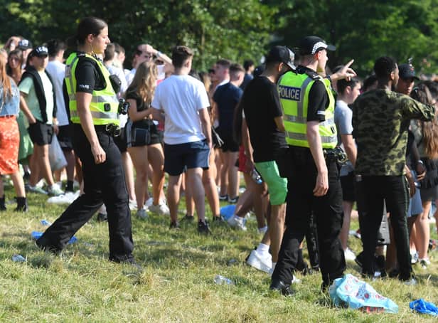 Large crowds gather at Kelvingrove Park in the summer 