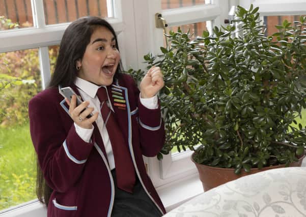 Zainab Alani (17), from Newton Mearns,
was delighted when she received her exam results.