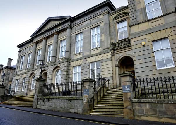 Wheelchair users can access Lanark Sheriff Court using a ramp at the front of the building.