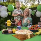 Author and tv presenter Cat Cubie and her kids Roar (3) and Indy (5) take advantage of a rare afternoon of sunshine to enjoy an outdoor coffee morning in aid of Macmillan Cancer Support. Photo: Wattie Cheung Photography