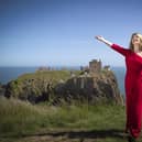 Scottish singer, song-writer and broadcaster Fiona Kennedy on the clifftop overlooking Dunnottar Castle. Photo: Jane Barlow/PA Wire