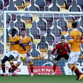 The ball strikes Bevis Mugabi’s arm, leading to the concession of the first penalty in Motherwell’s 5-1 defeat by Rangers (Pic by Ian McFadyen)
