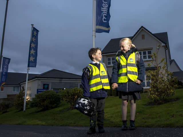 Pictured from left to right Evie Downs (7) and Jake Pentland (5) are the first to try out their new high vis vests from Miller Homes as part of the house builder’s Home Safe campaign