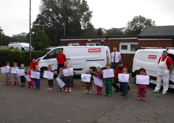 The team from Mears with the children of Kidstore Daycare in Kilsyth