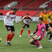 Partick Thistle keeper Jamie Sneddon saves from David Goodwillie (pic: CraigBlackPhotography.com)