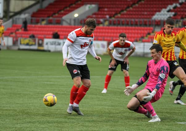 Partick Thistle keeper Jamie Sneddon saves from David Goodwillie (pic: CraigBlackPhotography.com)