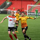 Clyde's Matthew Shiels battles for possession with ex-Kilsyth Rangers striker Salim Kouider-Aissa (pic: CraigBlackPhotography.com)