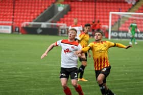 Clyde's Matthew Shiels battles for possession with ex-Kilsyth Rangers striker Salim Kouider-Aissa (pic: CraigBlackPhotography.com)