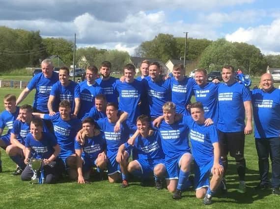 Lanark United squad celebrate winning the 2018-2019 McBookie.com League Two crown