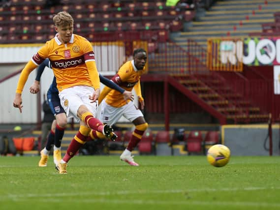 Mark O’Hara slots home from the penalty spot against Ross County on Saturday (Pic by Ian McFadyen)