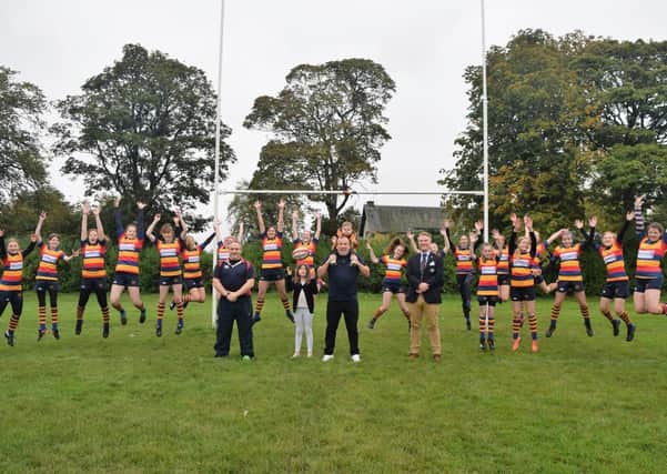 Lenzie Girls Rugby celebrate their new sponsorship deal with Hamilton Robertson Insurance Brokers