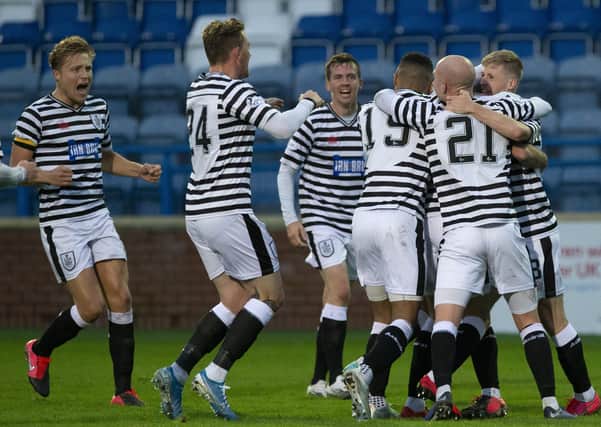Queen’s Park’s players celebrate Ross MacLean’s goal (Photo: Ian Cairns).