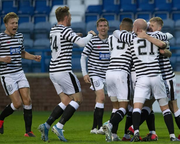 Queen’s Park’s players celebrate Ross MacLean’s goal (Photo: Ian Cairns).