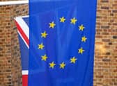The Union Jack pictured behind the European Union flag in London.
