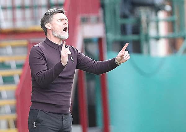 Motherwell manager Graham Alexander reacts during his side's Ladbrokes Scottish Premiership match against Rangers at Fir Park on January 17. (Photo by Ian MacNicol/Getty Images)