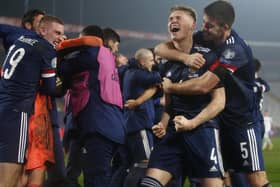 Declan Gallagher (1st right) celebrates with fellow Scotland heroes after historic penalty shootout win in Serbia (Pic courtesy of Getty Images)