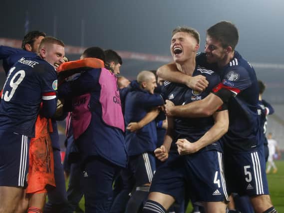Declan Gallagher (1st right) celebrates with fellow Scotland heroes after historic penalty shootout win in Serbia (Pic courtesy of Getty Images)