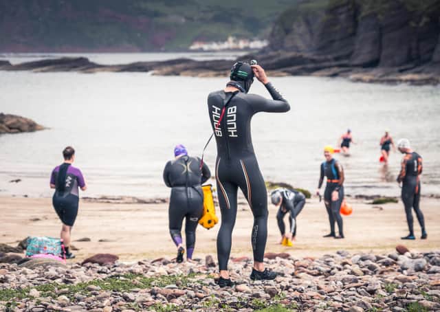 Braving the water...wild swimmers prepare for a dip at Cullykhan Bay, a delightful sandy cove in Aberdeenshire. (Pic: Damian Shields)