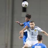 Stephen O'Donnell contests an aerial duel in Israel (Pic courtesy of Getty Images)