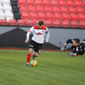 David Goodwillie evades Montrose keeper Aaron Lennox to score his first goal (pic: Craig Black Photography)