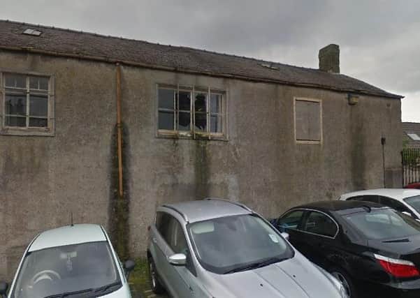 The Lanark Development Trust project includes the demolition of this derelict building in Hunter’s Close.