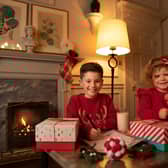 Jessica Roer and Seb Kwiecinska Randall help launch VisitScotland’s new festive Love Local campaign. Photo: VisitScotland