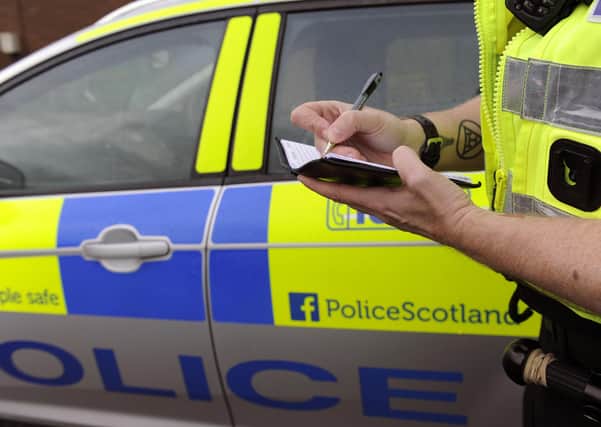 John Devlin 20/10/14. Police stock shots. Accident , sign , WPC , policeman , roads , crime, POLICE , force , forensic , drink driving , crime , breathalyser , radio , CS or PAVA (also known as Captor) incapacitant spray, Batons , baton.