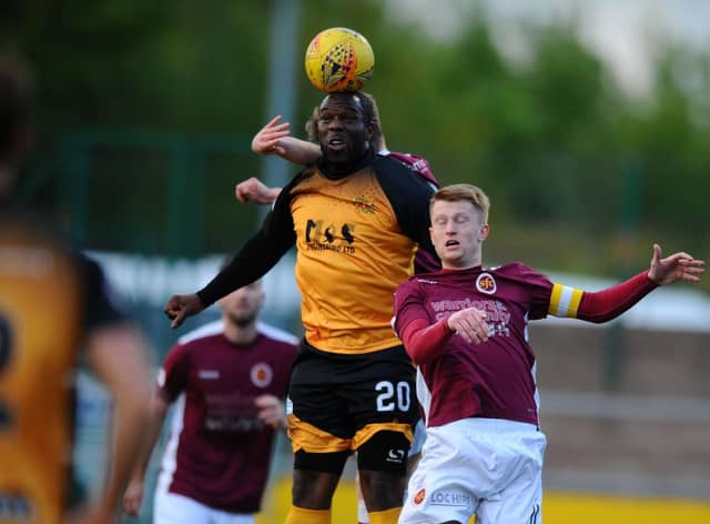 Man of many clubs Christian Nade playing for Annan against Stenhousemuir in May 2019 (Pic by Michael Gillen)