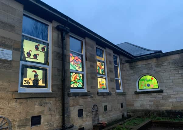 Some of the winter-themed windows on display at Giffnock Primary School.