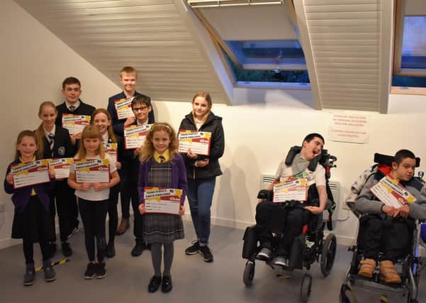 Winners of the Lanark Young People’s Photo Challenge gathered to receive their certificates and prize vouchers