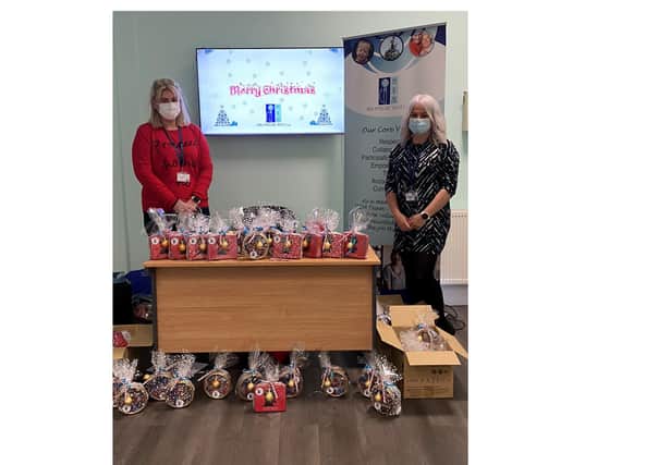 Caring HRM Homecare staff wrap up special Christmas packages for service users in East Renfrewshire
