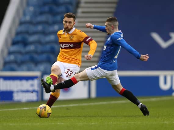Motherwell defender Stephen O’Donnell takes on Rangers’ Ryan Kent at Ibrox on Saturday (Pic by Ian McFadyen)