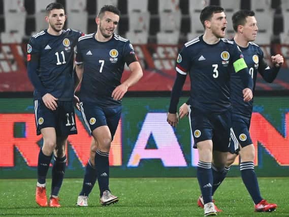 Scotland skipper Andy Robertson (second right) celebrates with team-mates after Ryan Christie (far left) had scored in Serbia on our way to us reaching next summers Euro finals (Pic courtesy of Getty Images)
