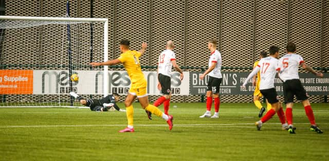 Clyde's defence looks back in anguish as Josh Kerr's shot finds the net for Airdrie