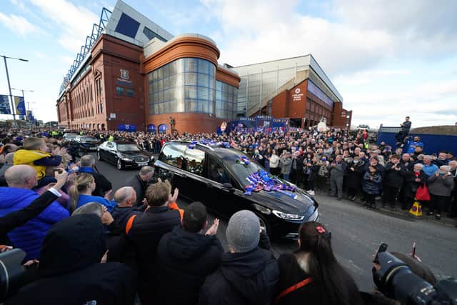 Crowds applaud as the funeral procession passes Ibrox Stadium, home of Rangers FC. Picture date: Wednesday November 3, 2021.