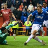 Arfield pounced on a spilled shot by Aberdeen keeper Kelle Roos to equalise in stoppage time.
