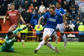 Arfield pounced on a spilled shot by Aberdeen keeper Kelle Roos to equalise in stoppage time.