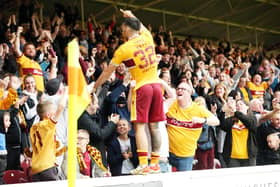 Tony Watt celebrates with the Motherwell fans, some of whom he has now angered with his decision to leave Fir Park (Pic by Ian McFadyen)